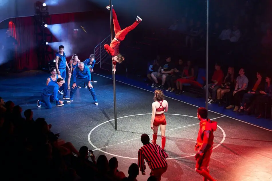 Acrobatics dressed in red and blue