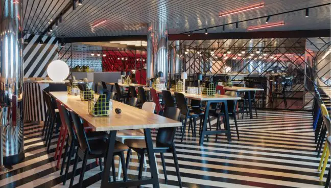 A stripe floor and seating at razzle dazzle