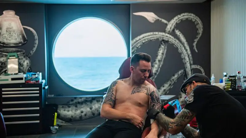 Squid Ink Tattoo Parlor on Virgin Voyages cruise ships