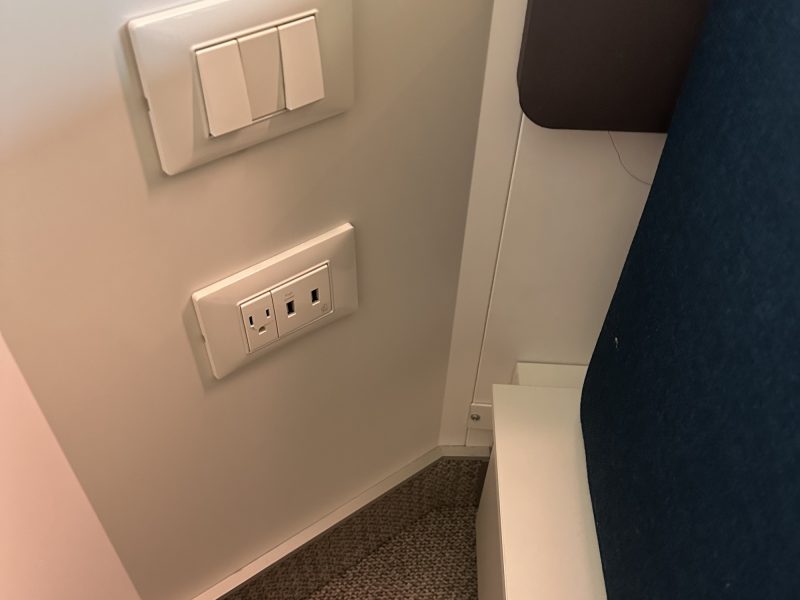 USB-A and USA outlets at the side of a bed