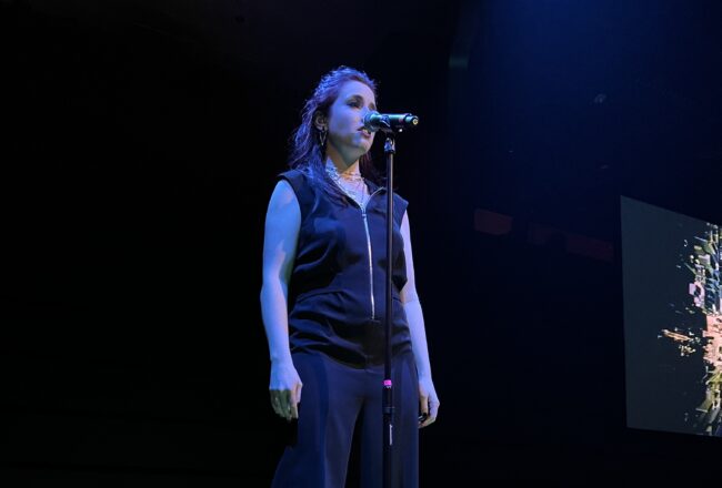 A singer at a microphone
