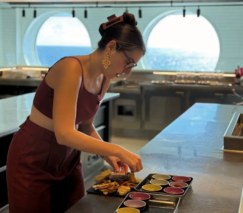 Faith the Foodie setting up a charcuterie board