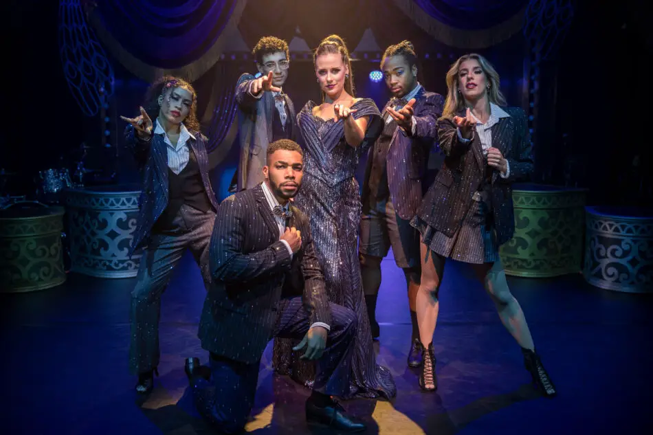 World-class vocalists and dancers take the stage. in Up with a Twist