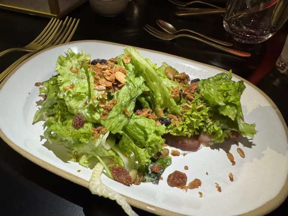 Red Wine Poached Pear Salad served in Up with a Twist