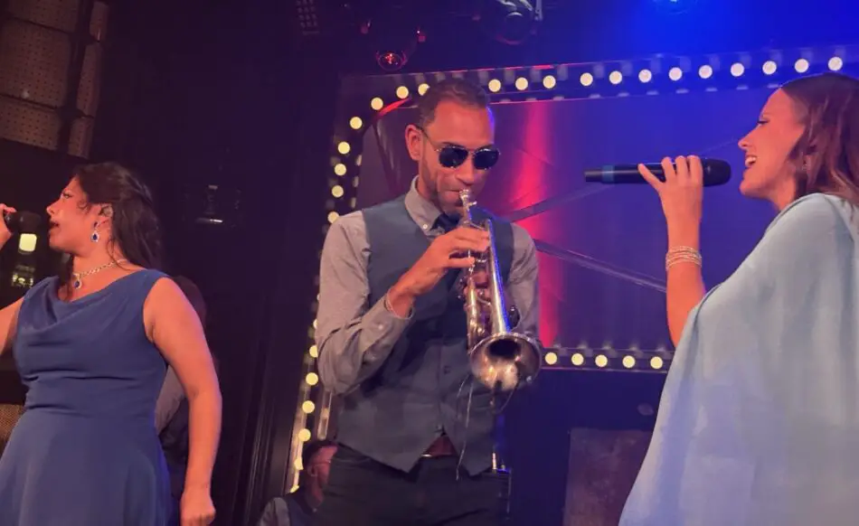 Trumpet solos join the vocals, bringing an upbeat jazz energy to Duets