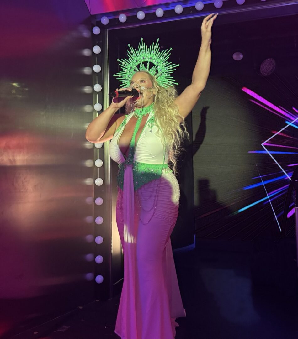 Abi the Hostess performs during Electric party