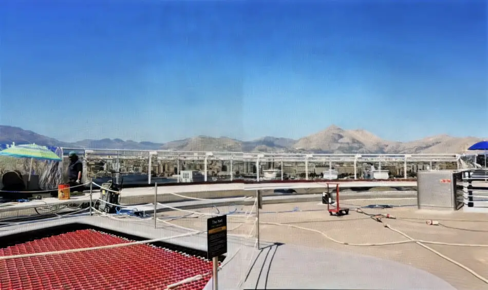 Construction images show new glass railings on the aft of Deck 16