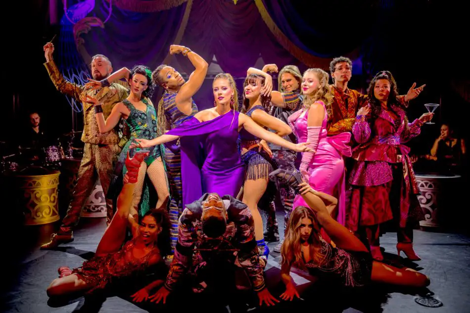 World-class vocalists and dancers take the stage. in Up with a Twist