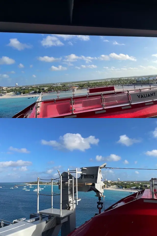 View from a Virgin Voyages cabin balcony onto a red lifeboat deck and blue sea