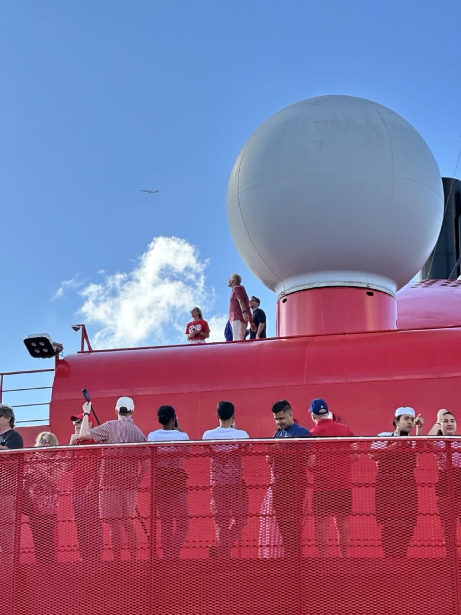 Sailors spotted Sir Richard Branson standing on the roof of Brilliant Lady waving to helicopter-mounted cameras