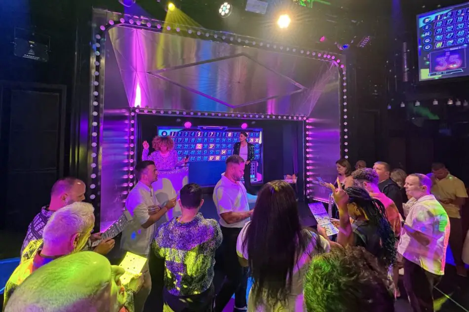 Eyes Down, Cards Out – Sailors crowd The Manor floor, cards in hand, as the first numbers drop in this high-speed game.