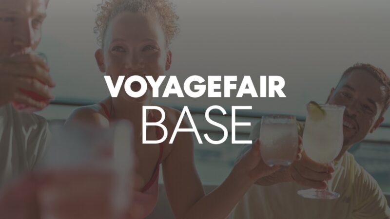Group of friends on a cruise ship deck toasting cocktails with VOYAGEFAIR BASE overlay
