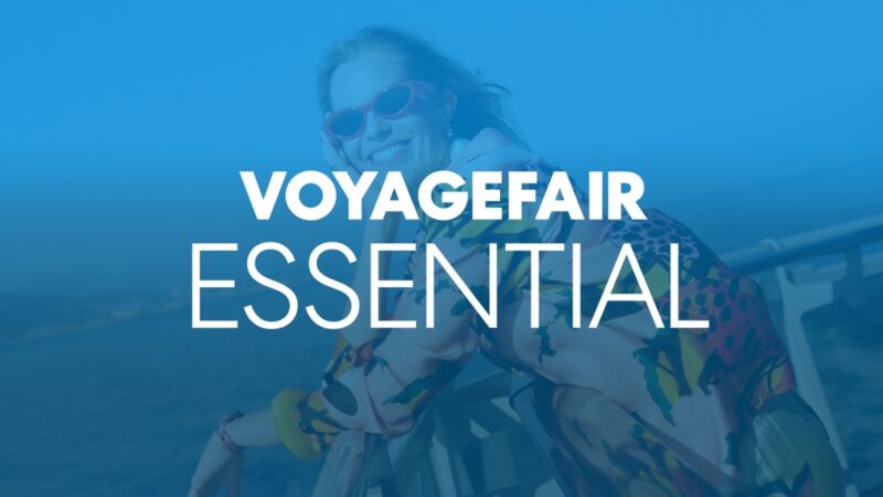 Woman on a cruise ship deck with blue overlay and VOYAGEFAIR ESSENTIAL text