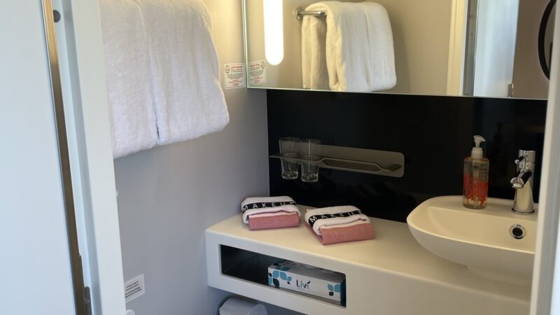 Virgin Voyages cruise cabin bathroom with toilet and sink