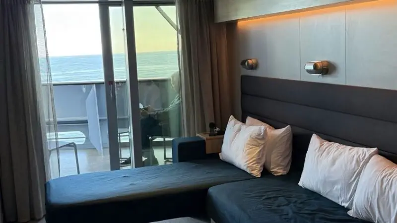 Virgin Voyages cruise ship cabin with balcony and ocean view
