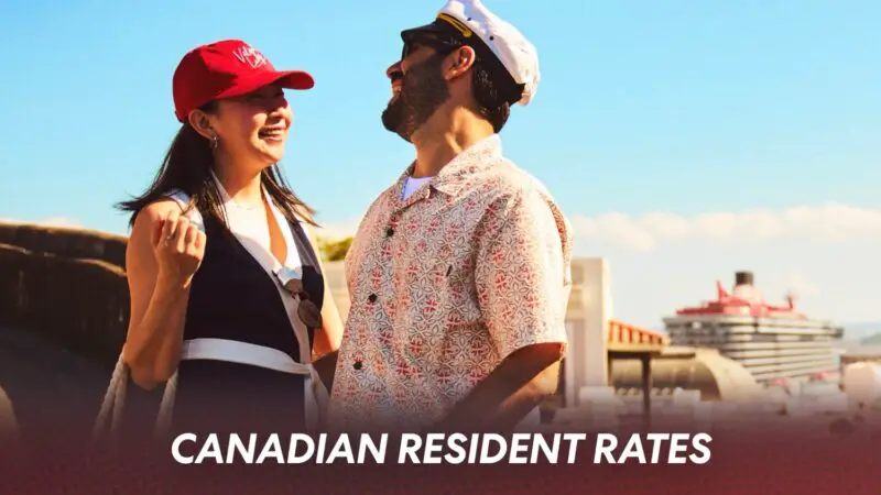 Two people on a Virgin Voyages cruise ship deck, smiling at each other