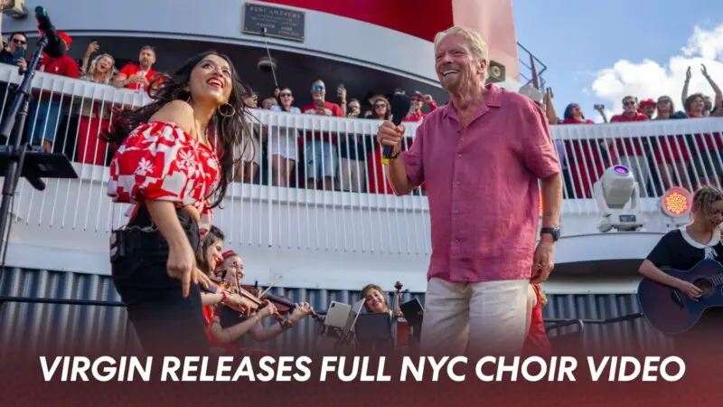 Singers and musicians perform on a Virgin Voyages cruise ship deck with cheering crowd