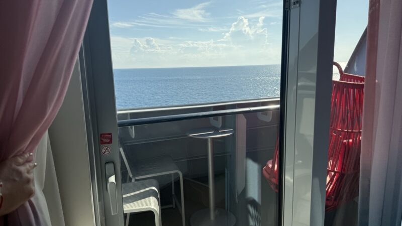 Ocean view from a Virgin Voyages cruise ship balcony cabin