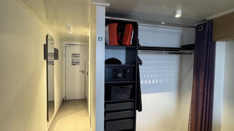 Virgin Voyages cruise ship cabin wardrobe with safe and drawers