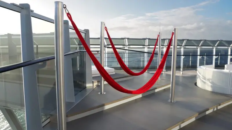 Red rope barrier on a Virgin Voyages cruise ship deck