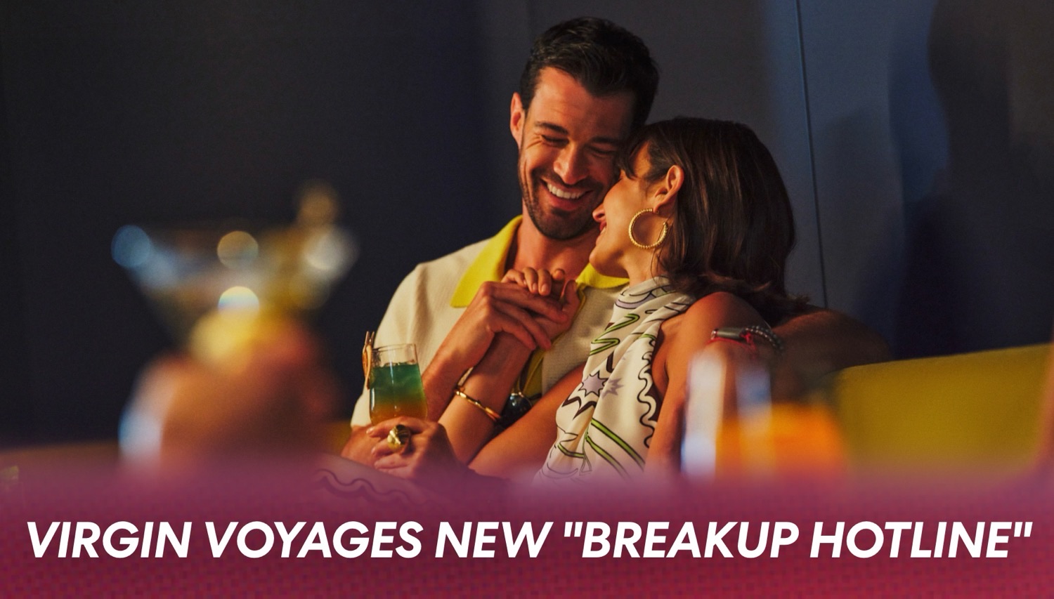 Couple enjoying drinks together on a Virgin Voyages cruise ship