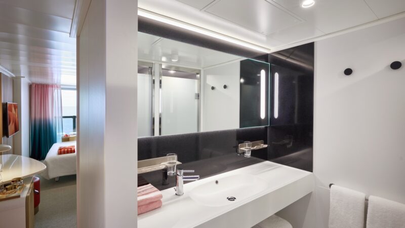 Virgin Voyages cruise ship cabin with modern bathroom vanity