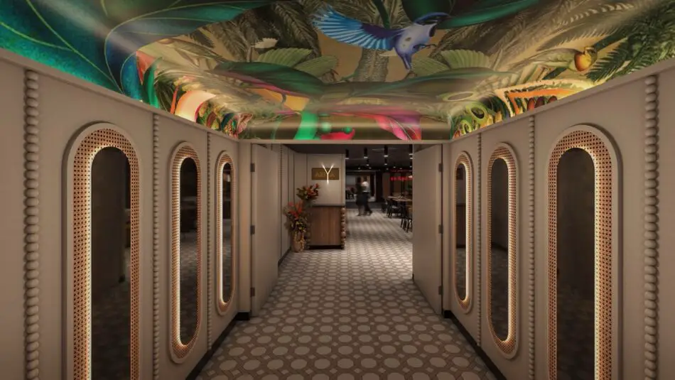 Long corridor on a Virgin Voyages cruise ship with arched mirrored wardrobe doors and a tropical ceiling mural