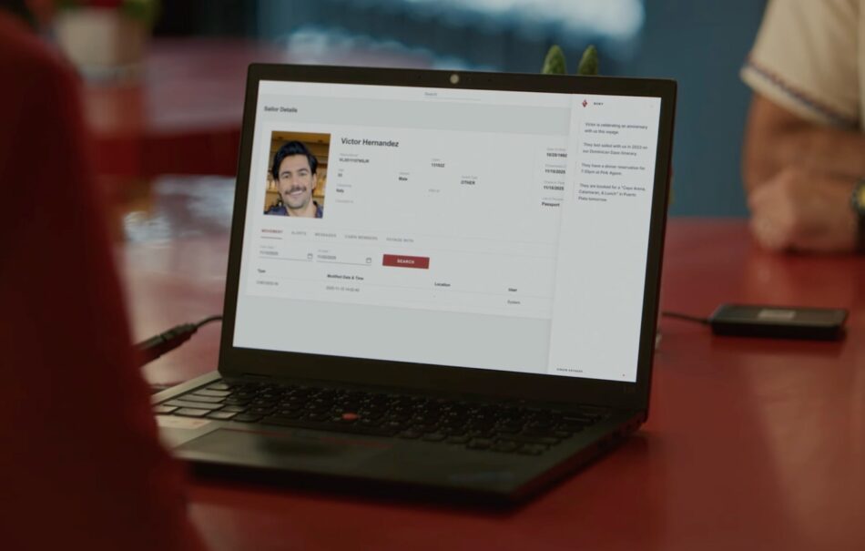 Laptop on red table displaying Victor Hernandez profile page