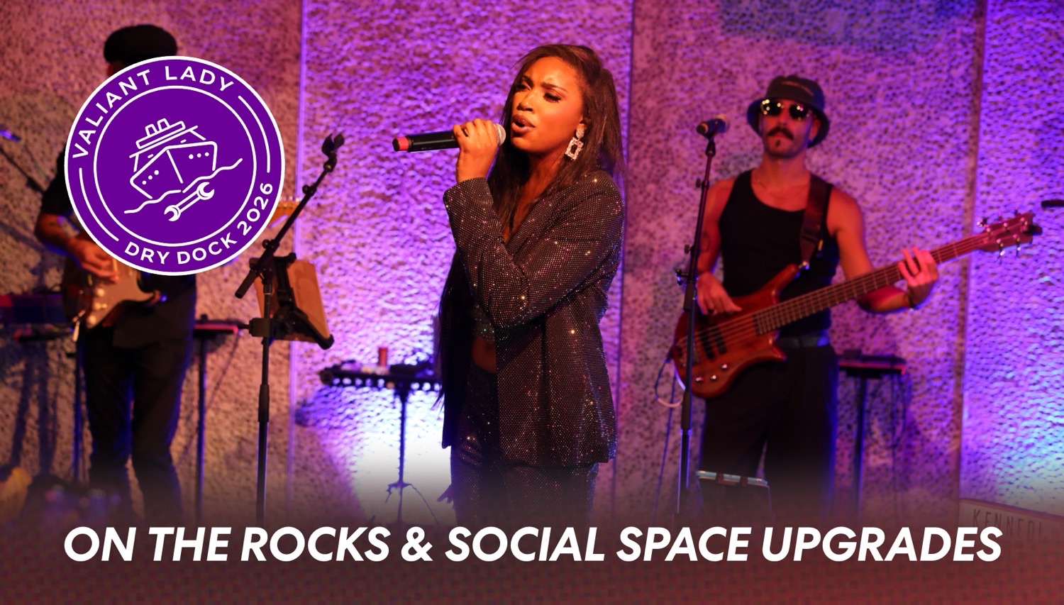 Female singer performs on stage aboard a Virgin Voyages cruise ship with a band under purple lighting