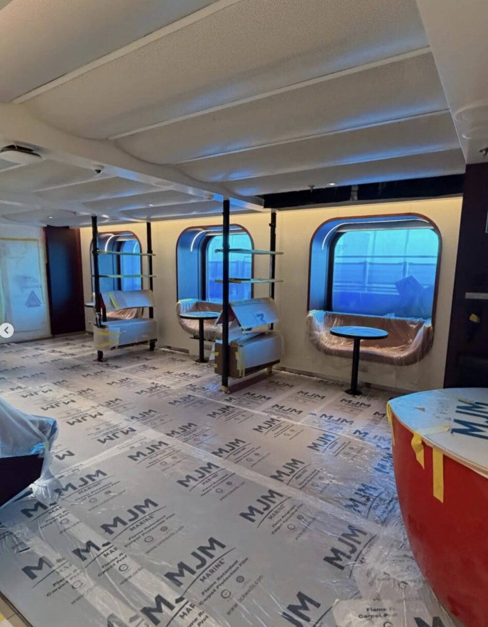 Virgin Voyages cruise ship cabin under construction with seating and large windows