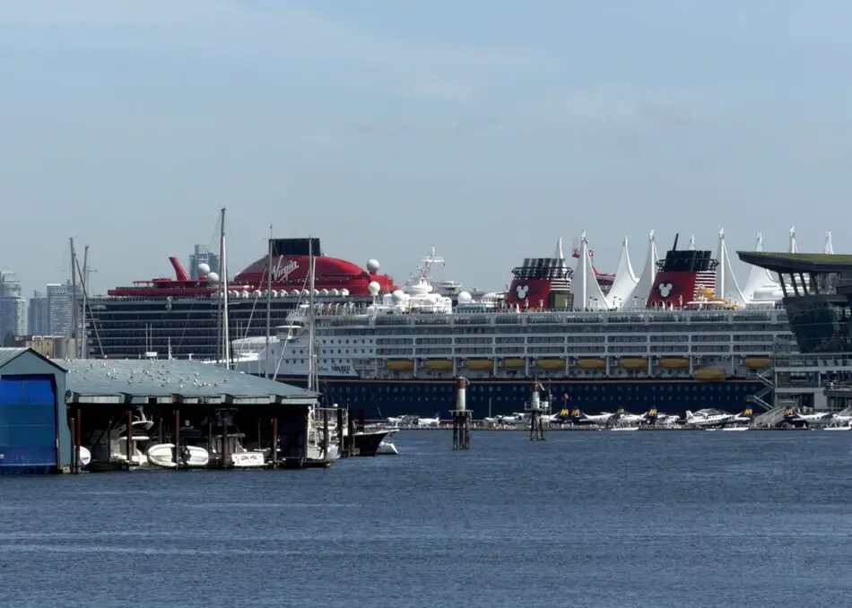 Virgin Voyages cruise ship docked at a busy harbor
