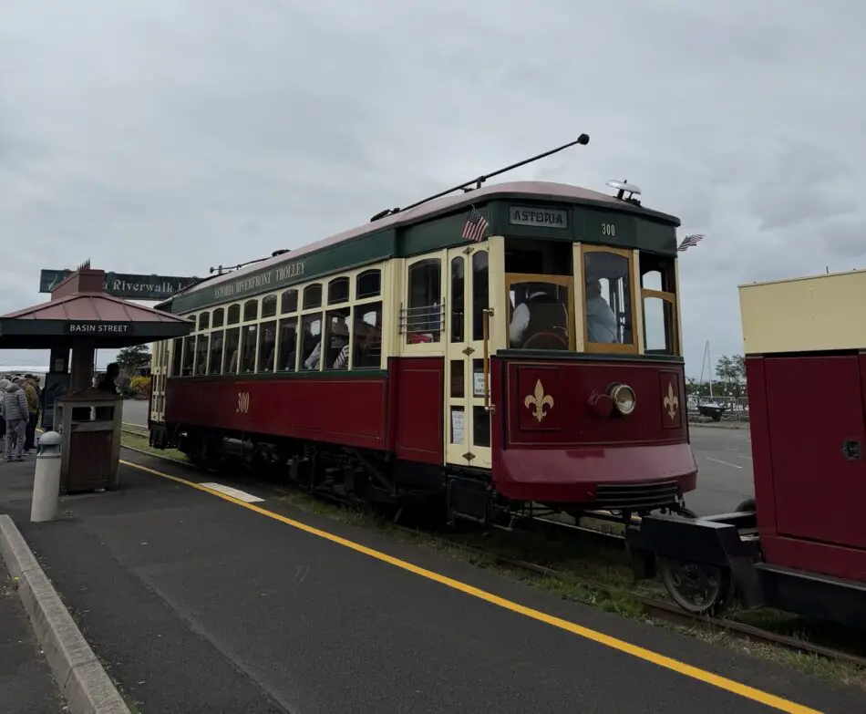 Vintage Astoria Riverfront Trolley at Basin Street station with passengers