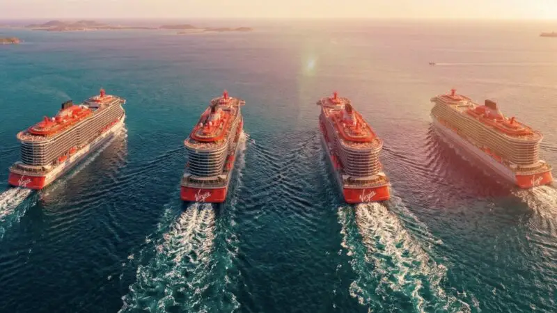 Four Virgin Voyages cruise ships sail together at sea