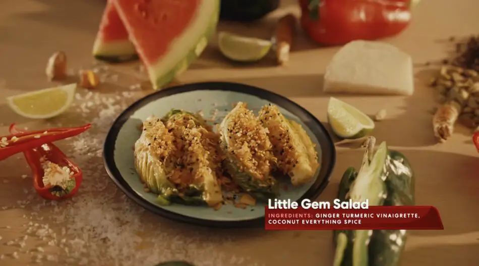 Little Gem Salad with crunchy topping on a plate