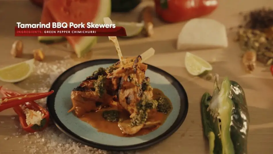 Tamarind BBQ Pork Skewers plated with sauce