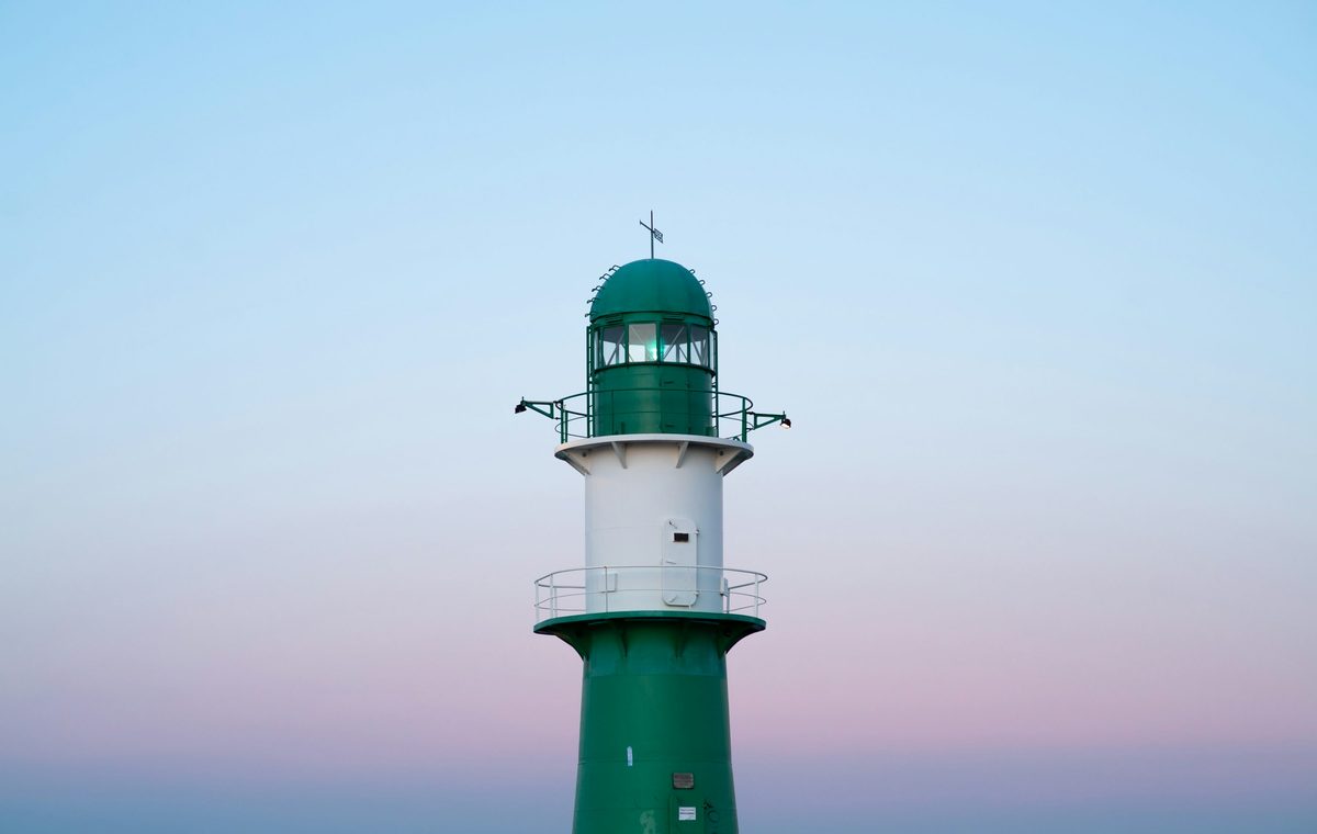 Green lighthouse at Warnemünde harbour, Germany