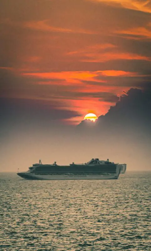 Cruise ship off Freeport, The Bahamas, at sunset
