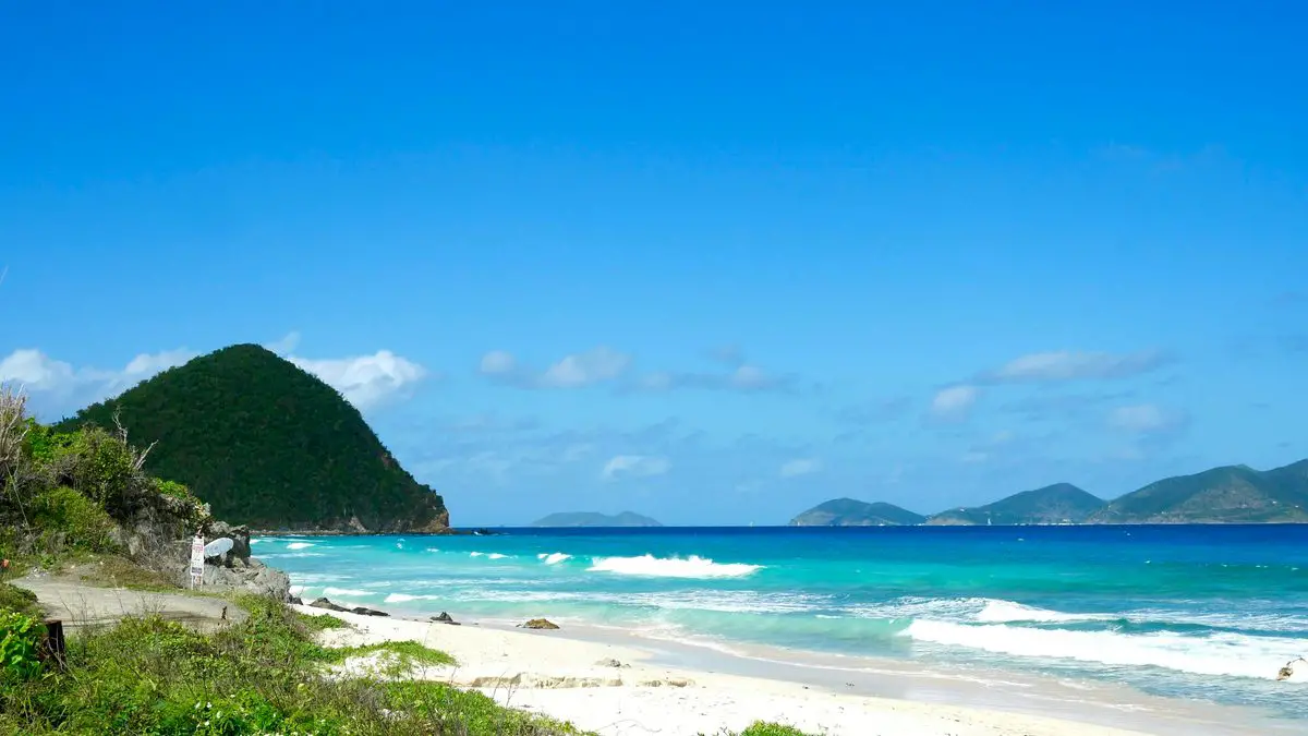 Beach and green headland on Tortola, British Virgin Islands
